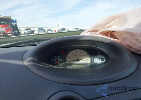 2000 Toyota Echo z USA, uszkodzony, nr VIN JTDBT1235Y0090528